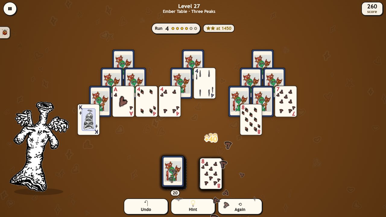Creep Solitaire: a Peaks table on brown felt, cards in three peaks, a run of four under way and one of her creatures watching